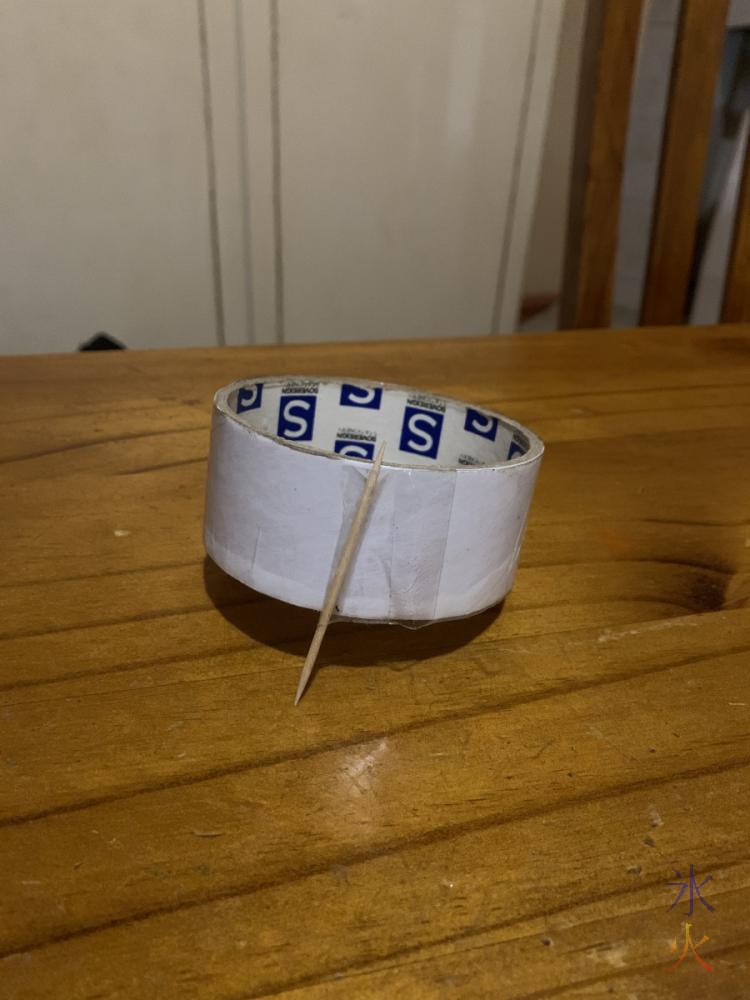 10yo's lifehack taping a toothpick to the end of the sticky tape so you don't lose it and it doesn't roll away