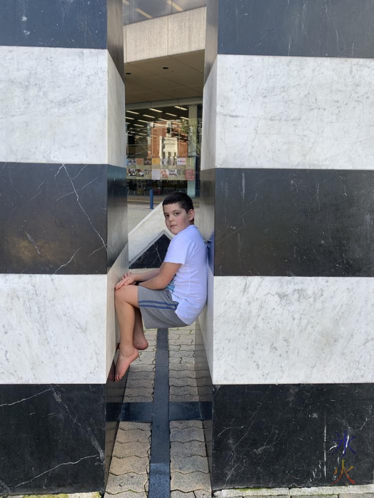 10yo wedged in sculpture in Perth Cultural Centre, Perth, Western Australia