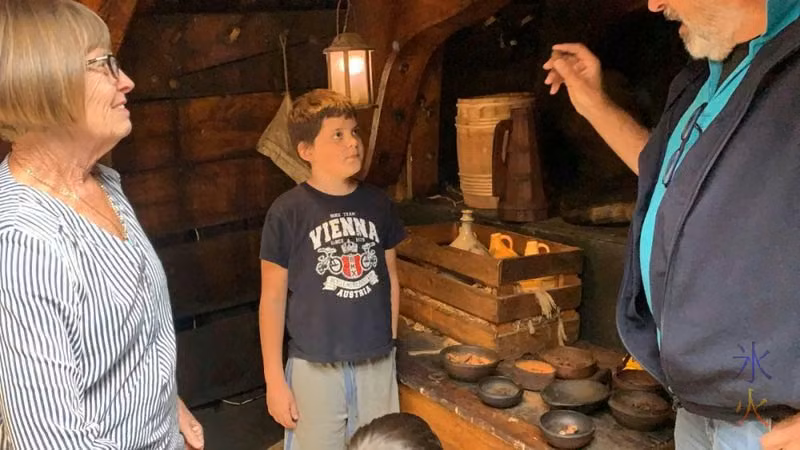 10yo listening o guide talk about spices and stuff aboard Duyfken replica, AQWA, Western Australia