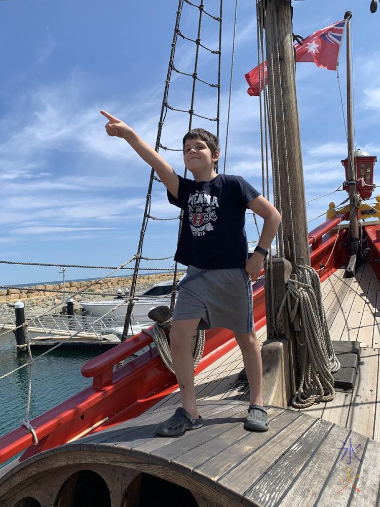 10yo posing on Duyfken replica, AQWA, Western Australia