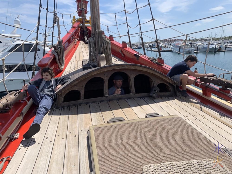 14yo and 10yo manning anti-personnel cannons at the back of the Duyfken replica, AQWA, Western Australia