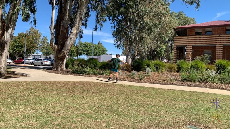 11yo skating down the path