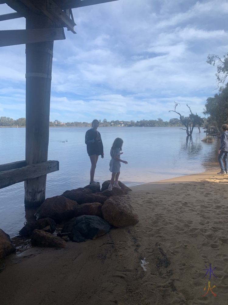 13yo and 6yo standing on rocks under Garrett Rd side of bridge, AP Hinds Reseerve, Bayswater, Western Australia