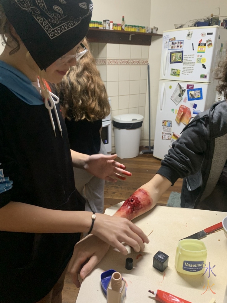 13yo making a 'bullet wound' on 15yo