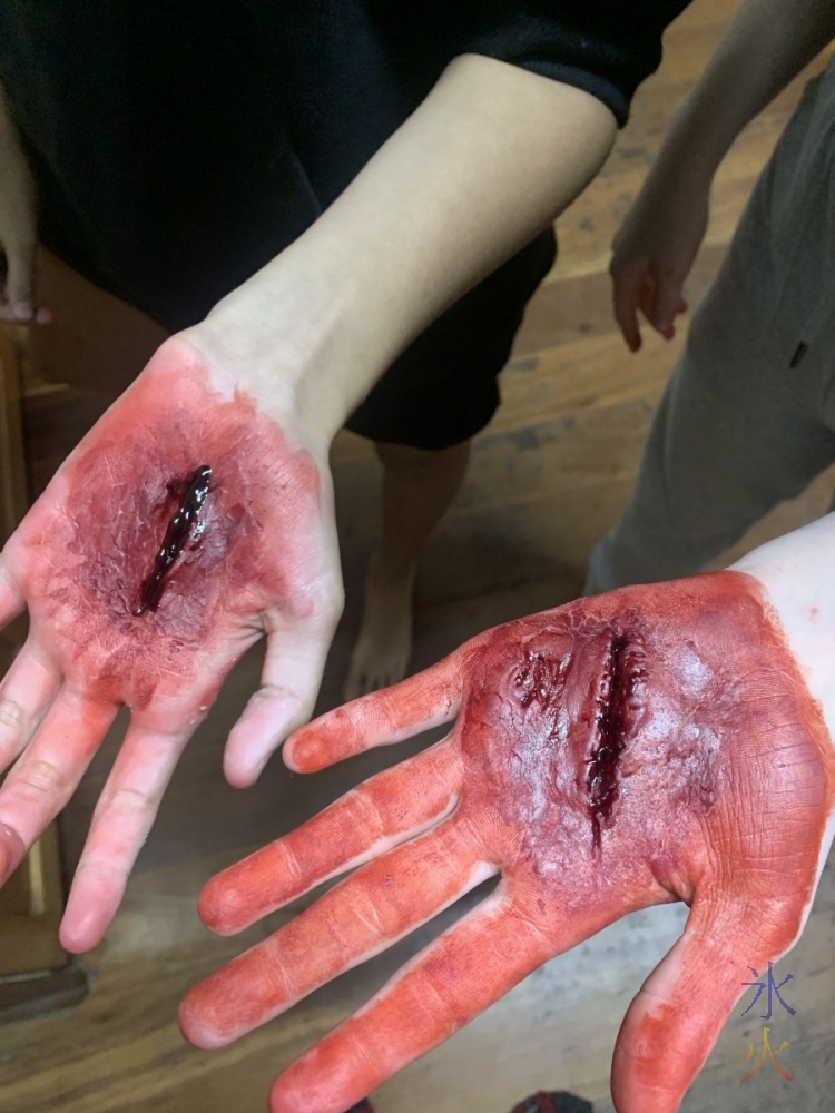 fake gashes made with Vaseline, flour and red food colouring