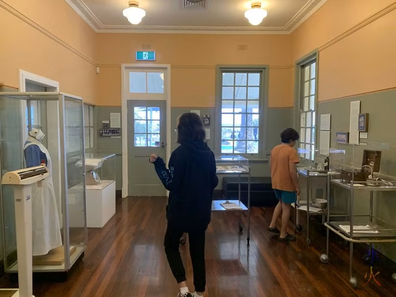 13yo and 11yo looking in the one-room Heathcote Museum, Applecross, Western Australia
