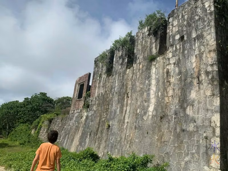 video game angle looking up at the bunker thing near the train station at South Point Village ruins, Christmas Island