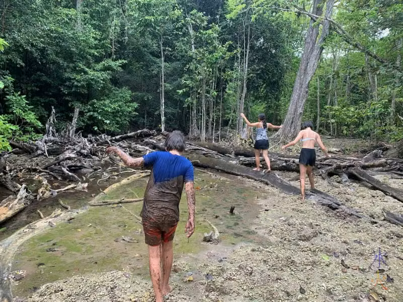 kids heading towards main part of the source at Hugh's Dale, Christmas Island