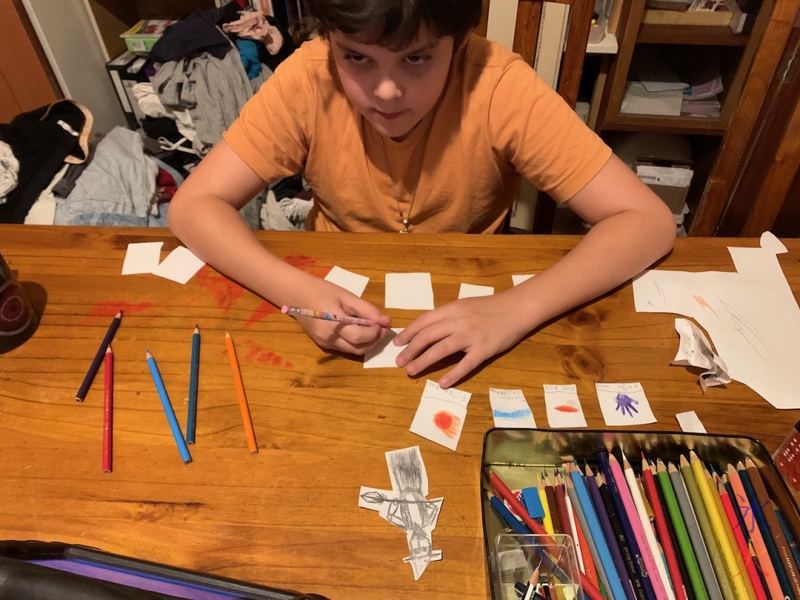 12yo drawing DnD spell and item cards