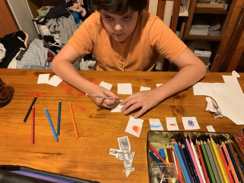12yo drawing DnD spell and item cards