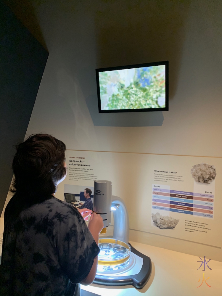 12yo studying gemstone under microscope at Boola Bardip Museum, Perth, Western Australia