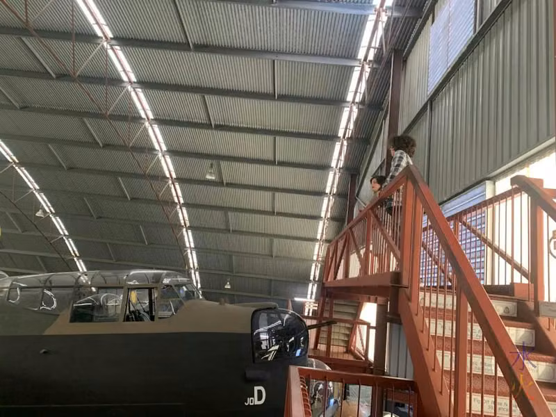 boys on viewing platform overlooking hangar at Aviation Heritage Museum, Bull Creek, Western Australia