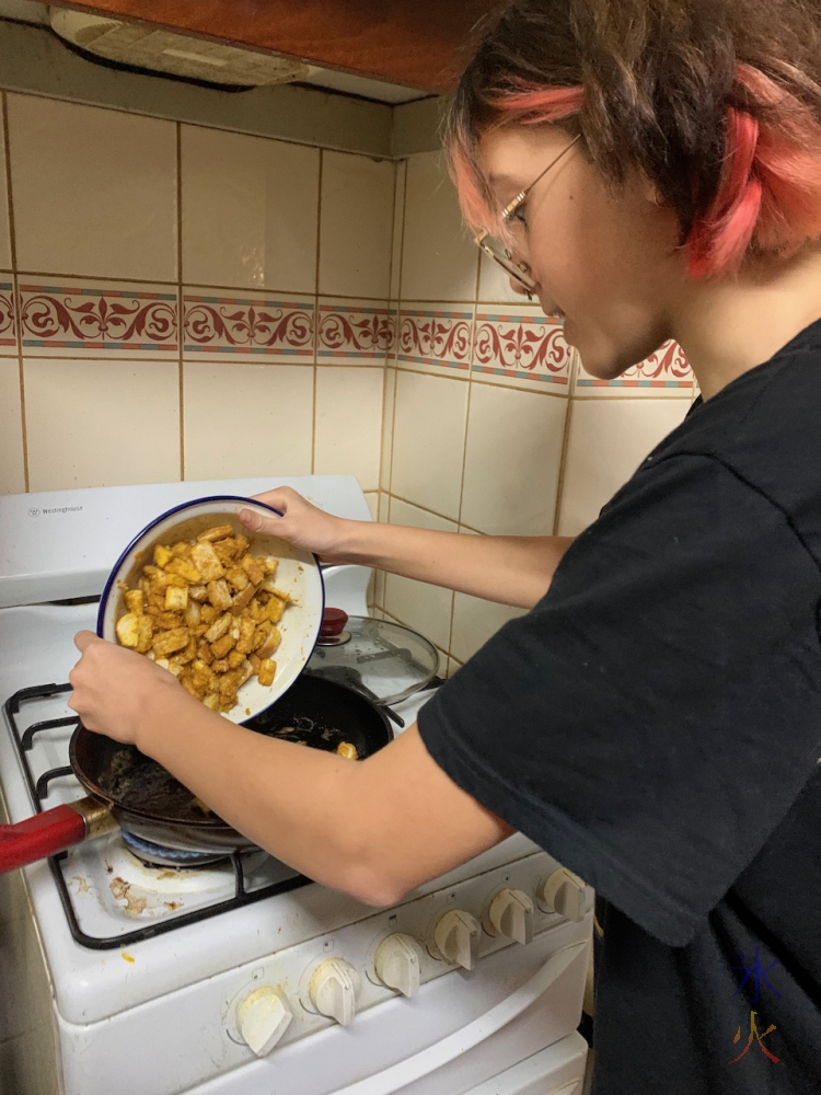 14yo drying up the bread crusts or something as a snack so they don't go to waste