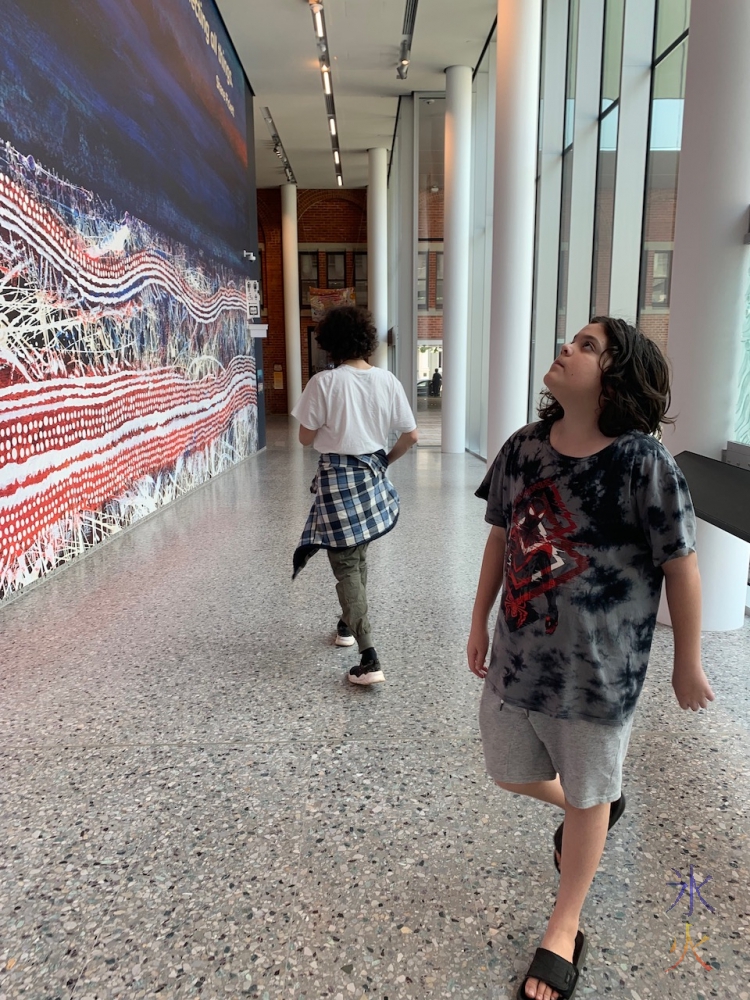 boys studying a mural at Boola Bardip Museum, Perth, Western Australia