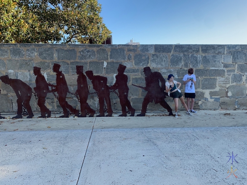 15yo posing with chain gang sculpture near Fremantle Prison, Western Australia
