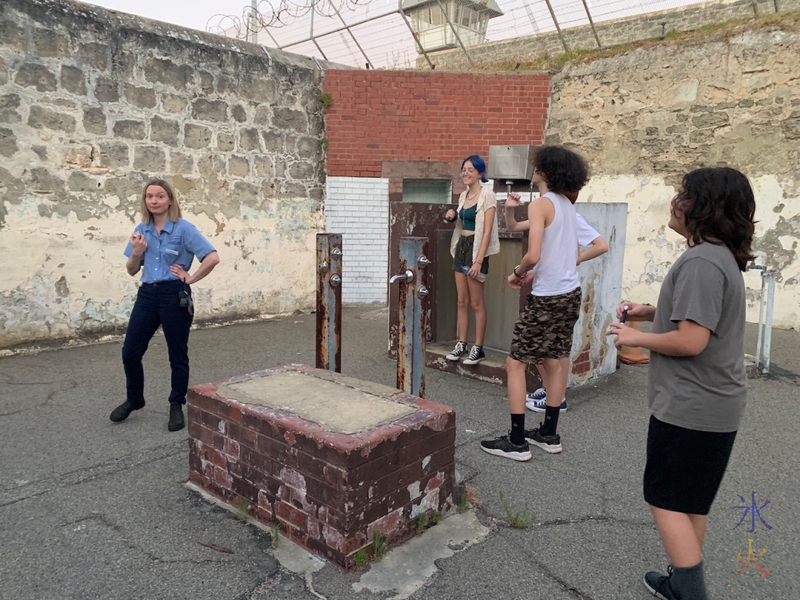 kids in exercise yard on Torchlight Tour at Fremantle Prison, Fremantle, Western Australia