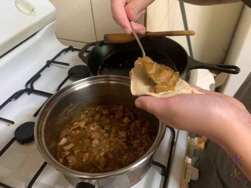 loading charsiu mix into pao dough