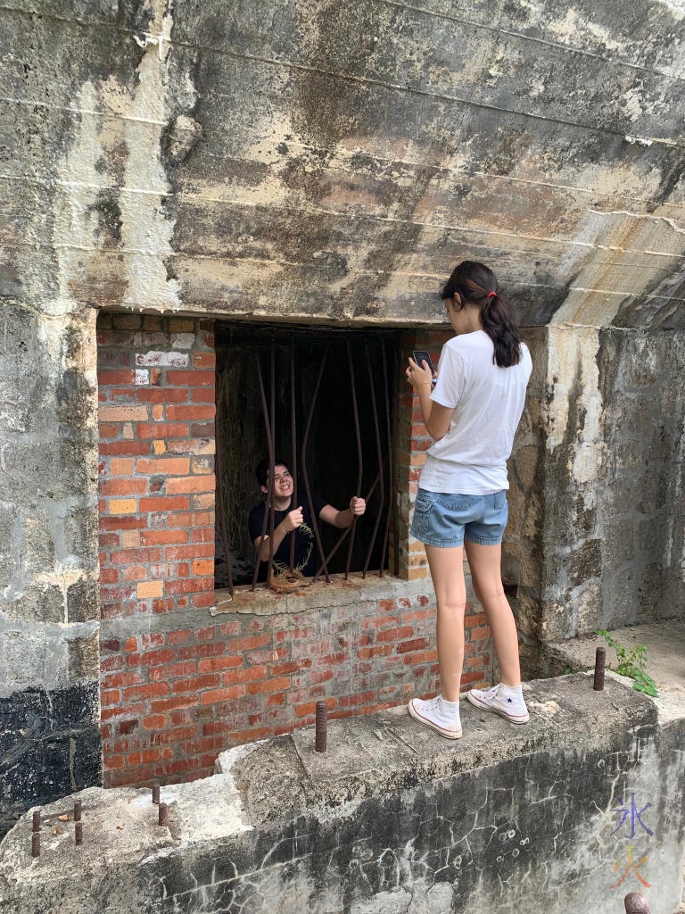 17yo taking photos of 15yo pretending to be stuck in jail