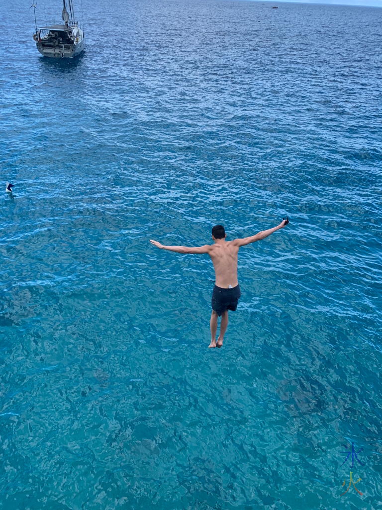 19yo on the way to the water after jumping off the jetty at Flying Fish Cove, Christmas Island