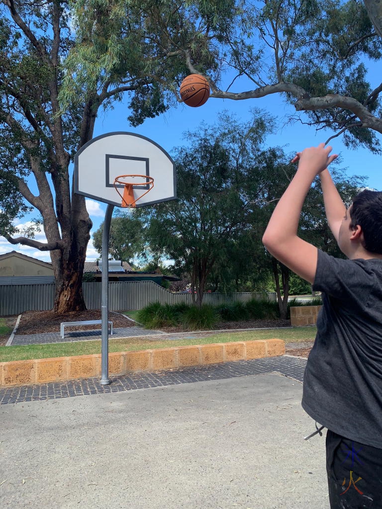 15yo shooting hoops