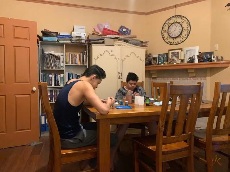 boys painting Warhammer Kill Team models