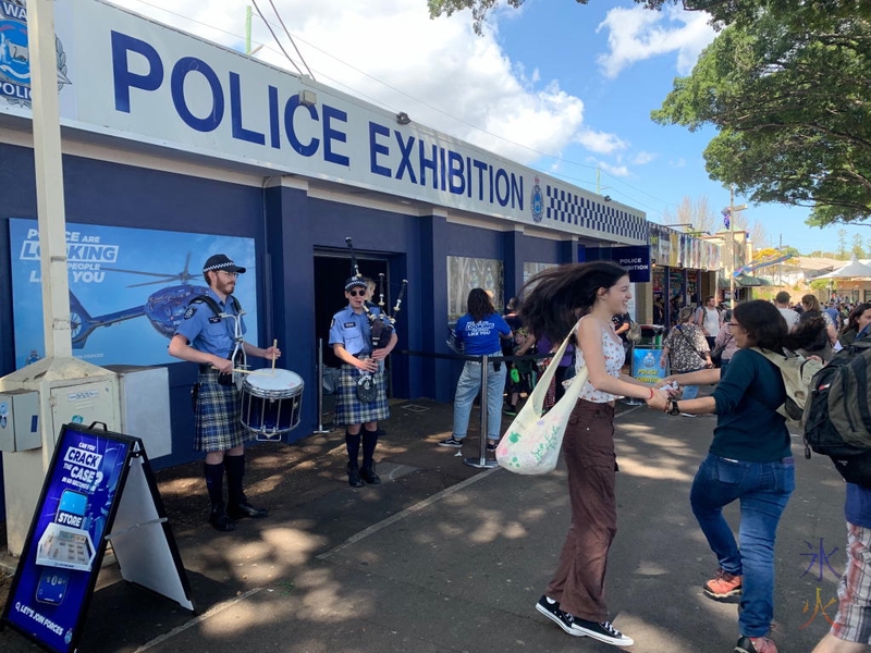 Sprat and 17yo dancing to the police bagpipe band playing outside the Police Exhibition at the Perth Royal Show