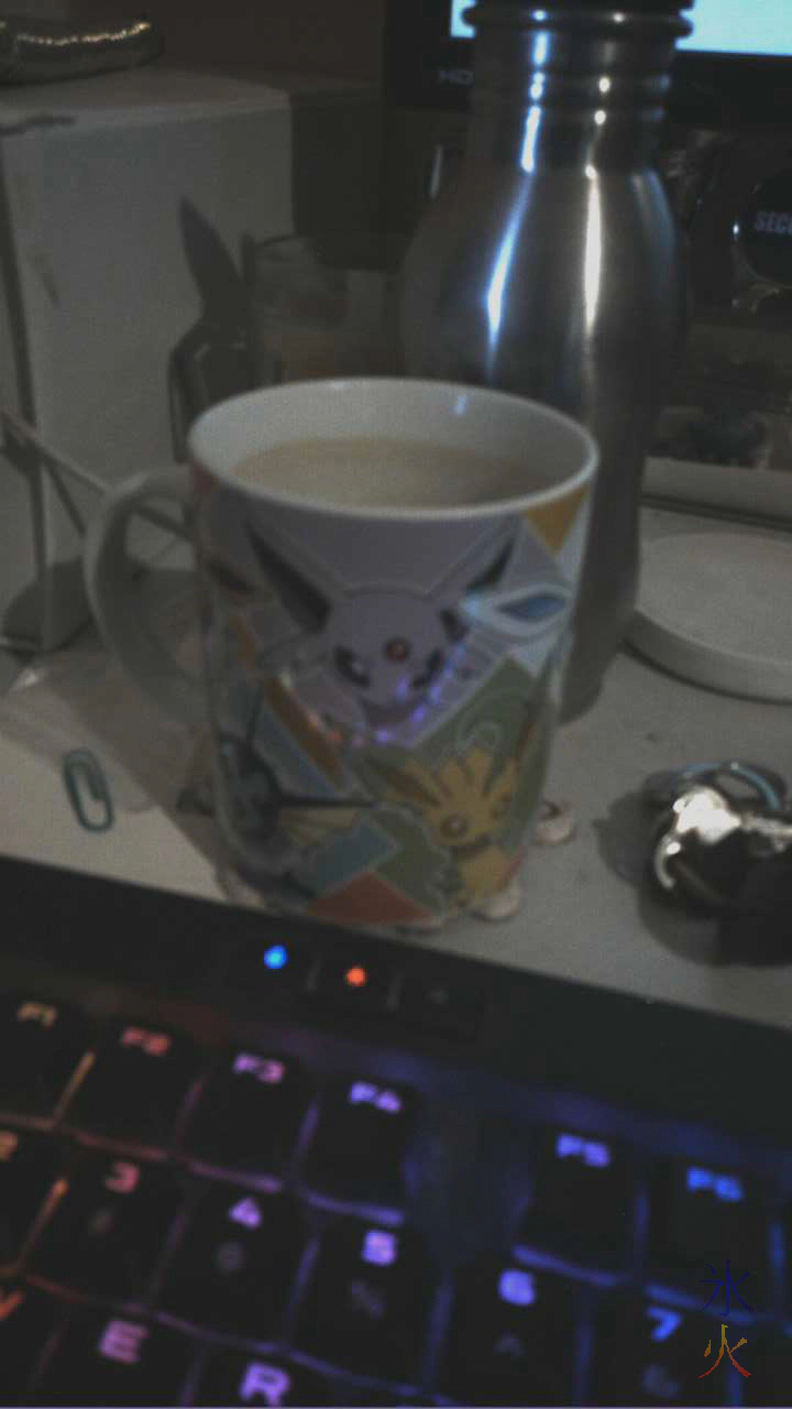 terrible photo of my Eeveelutions coffee mug on my messy desk taken with the PinePhone Pro terrible photo of my Eeveelutions coffee mug on my messy desk taken with the PinePhone Pro