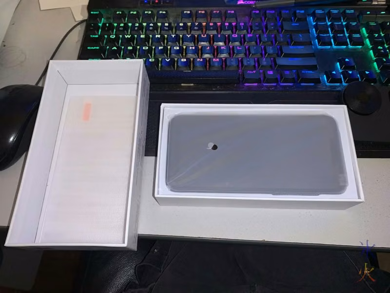 PinePhone Pro in box with lid off