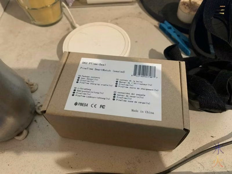 box sitting on very dusty desk