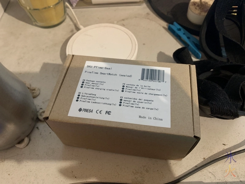 box sitting on very dusty desk