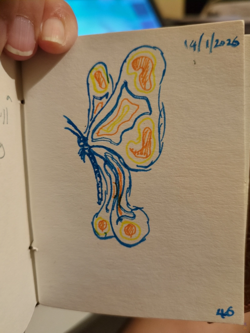 butterfly sketched with micron pens in tiny sketchbook