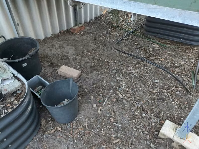 starting to clear gravel from under aquaponics grow bed