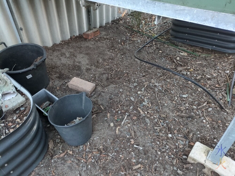 starting to clear gravel from under aquaponics grow bed