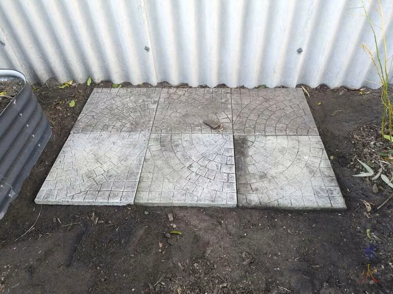 six concrete slabs laid on the ground