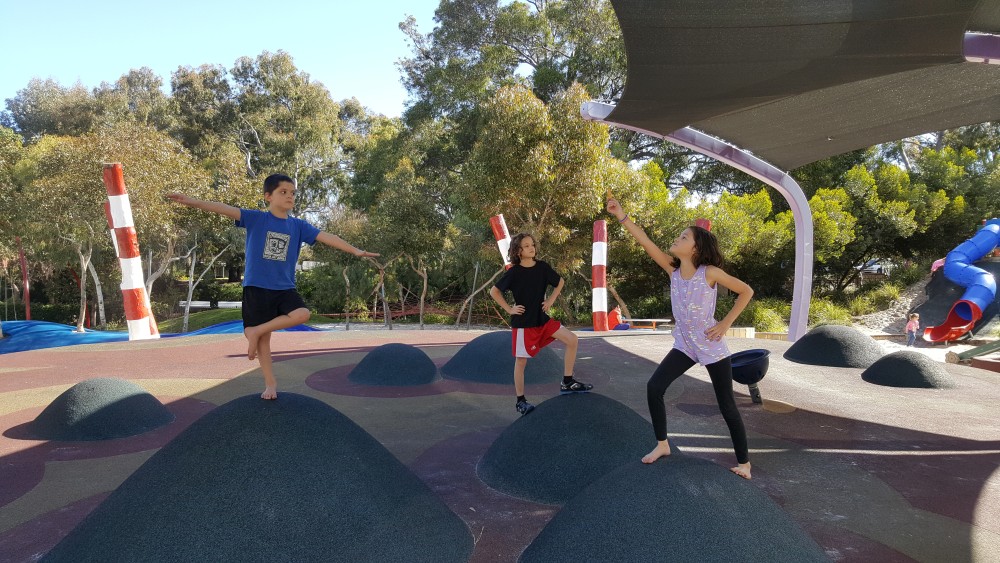 Kids posing for an artistic phot at Kadidjiny Park, Western Australia