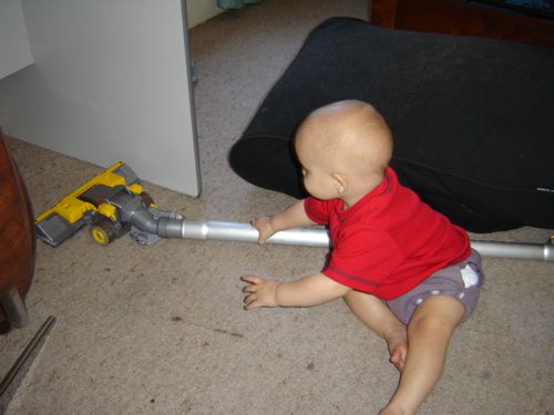 11 month old vacuuming