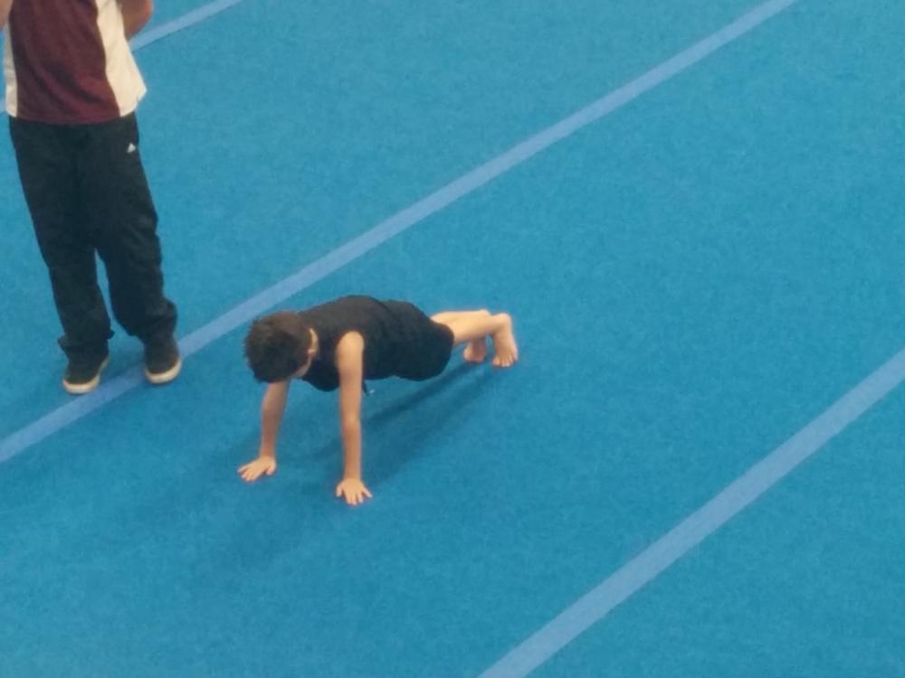 6yo doing a front support at his level 1 gymnastics badge test