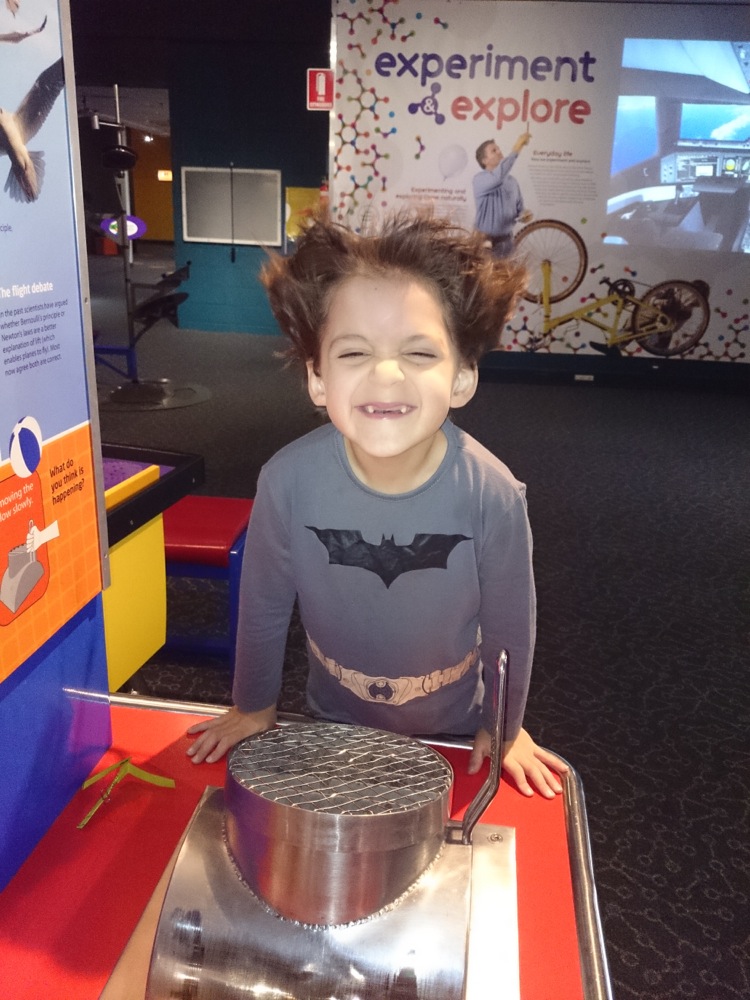 6yo playing with air pressure at SciTech, Perth, Western Australia