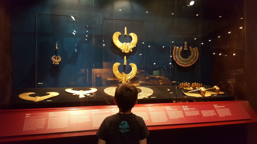 7yo studying adornments at King Tut exhibition, Convention Centre, Perth, Western Australia