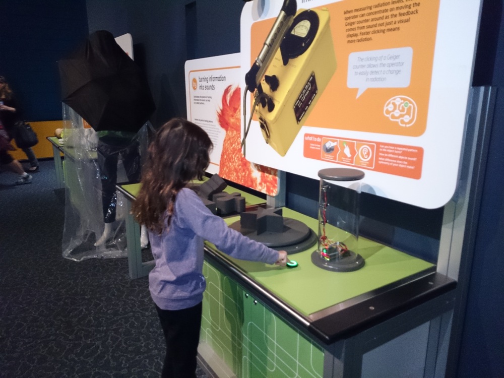 8yo experimenting with soundwaves at SciTech, Western Australia