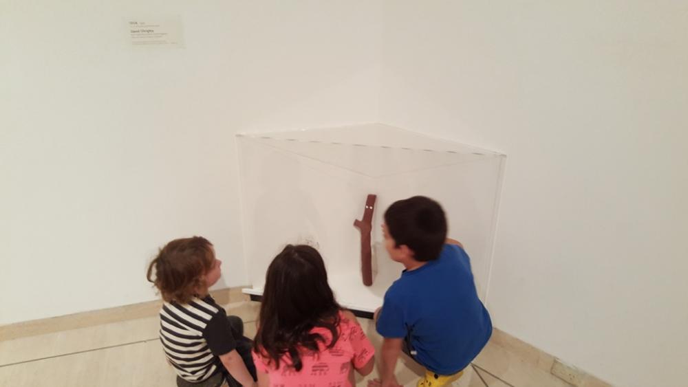 9yo showing 7yo and 3yo "Stick" which is one of her favourite pieces in the gallery, Art Gallery of Western Australia