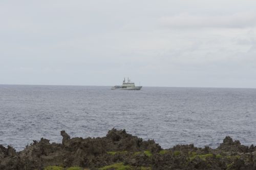 Navy ship off the cliffs above Lily Beach