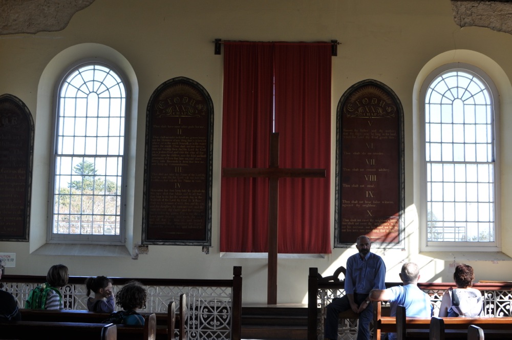 Listening to the your guide talking about the Church of England chapel in Fremantle Prison, Western Australia
