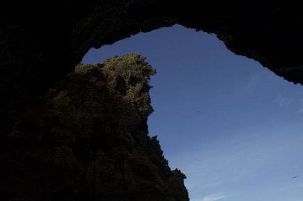 Looking up at the sky form in the cave