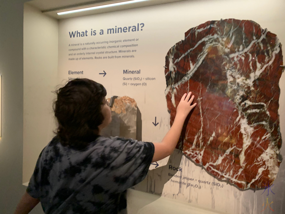 12yo investigating what a mineral is at Boola Bardip Museum, Perth, Western Australia