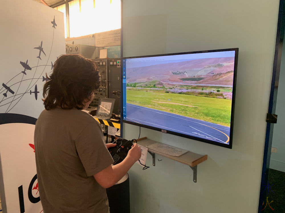 12yo trying to fly a virtual remote control glider at Aviation Heritage Museum, Bull Creek, Western Australia
