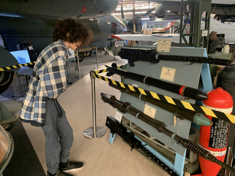 16yo getting way too enthused about some recoil mechanism on some gun that's supposed to be mounted on a plane, Aviation Heritage Museum, Bull Creek, Western Australia