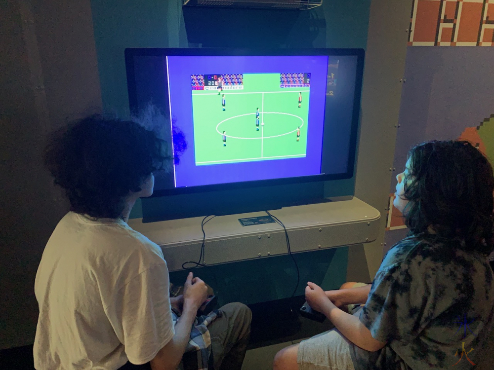 boys playing on old console at Boola Bardip Museum, Perth, Western Australia