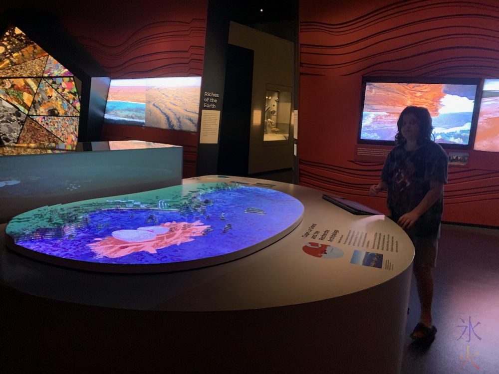 youngest listening to and watching visualisation of creation story at Boola Bardip Museum, Perth, Western Australia