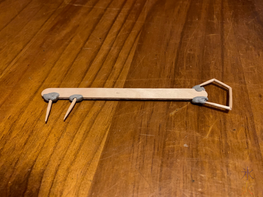11yo's skeleton key made of blutak, a popstick and toothpicks